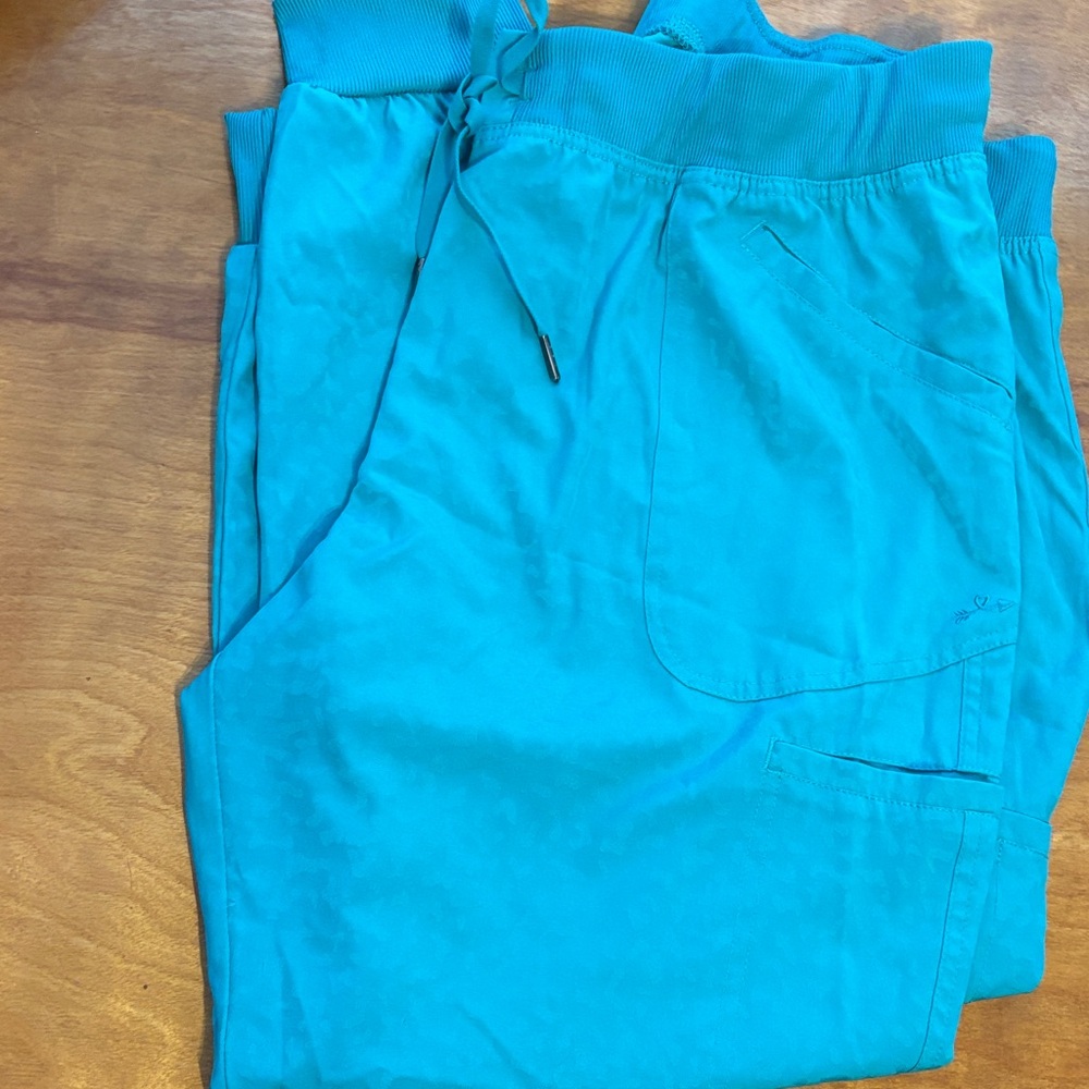 Leopard print teal scrub joggers